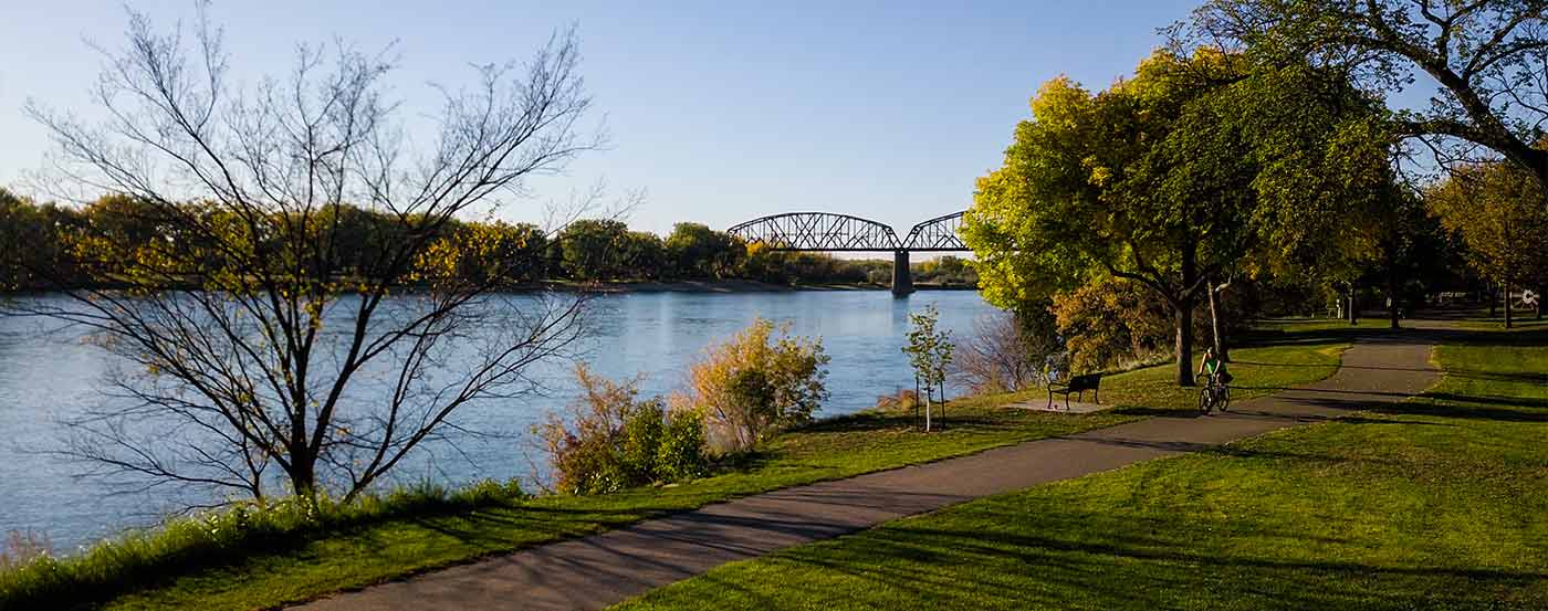 bike path along river at sunset